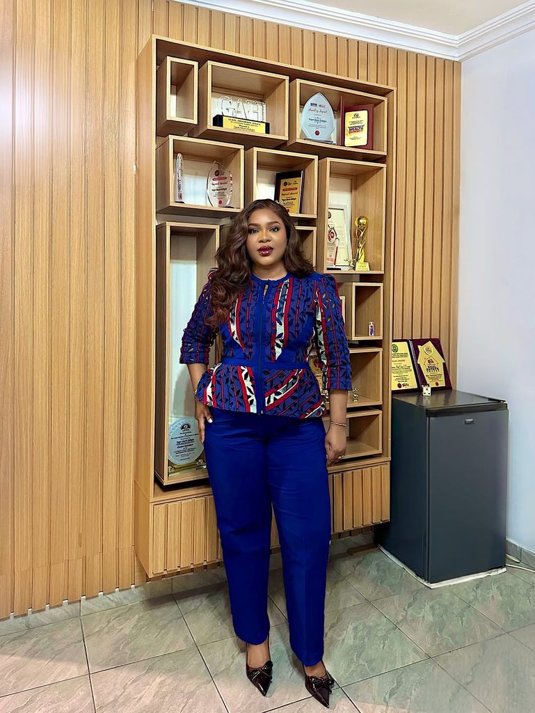 Adire shirt with plain trousers